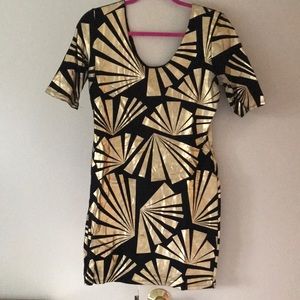 BeBe black and gold foil dress. Bodycon style.